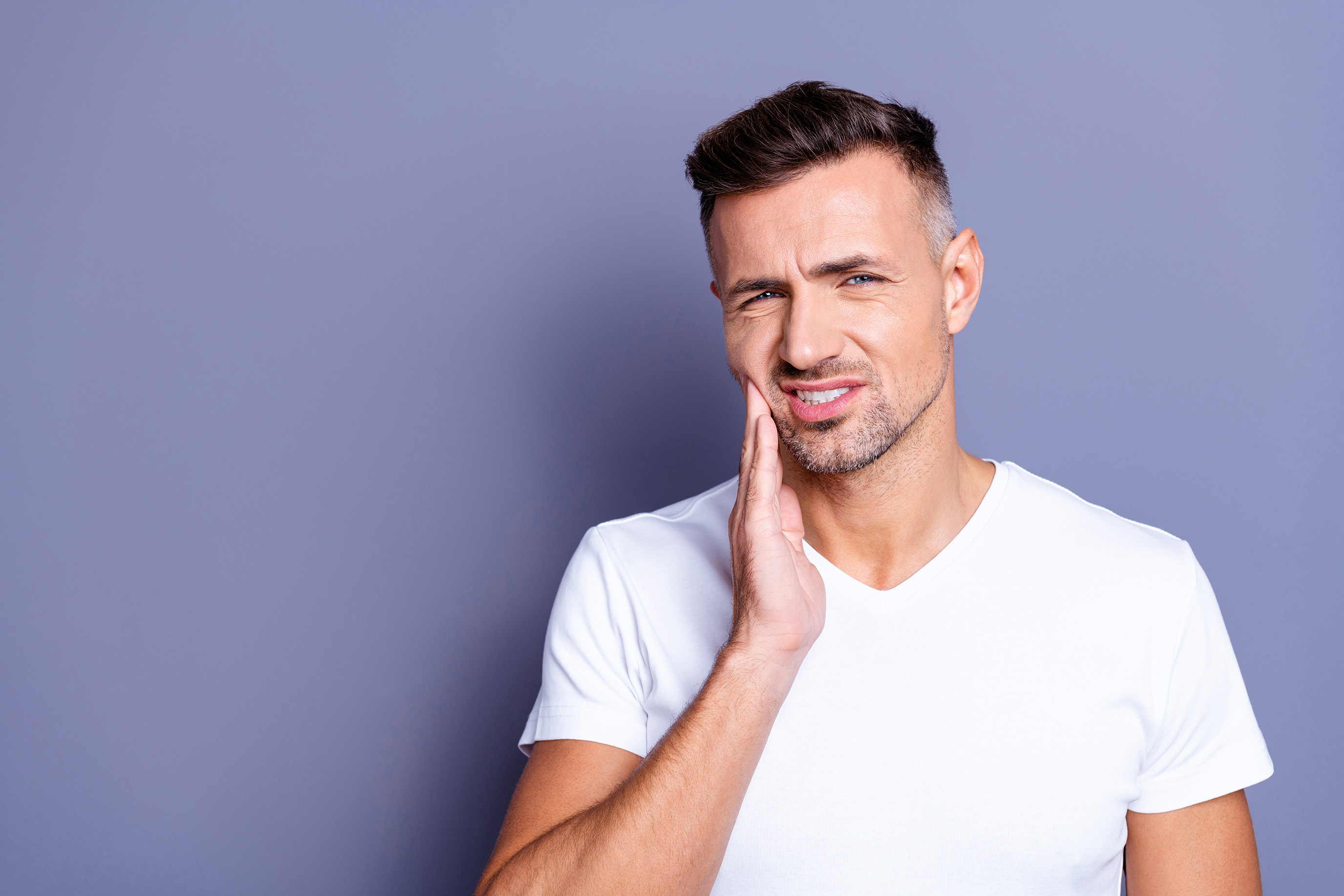 man in tooth pain in Chesterfield, MO