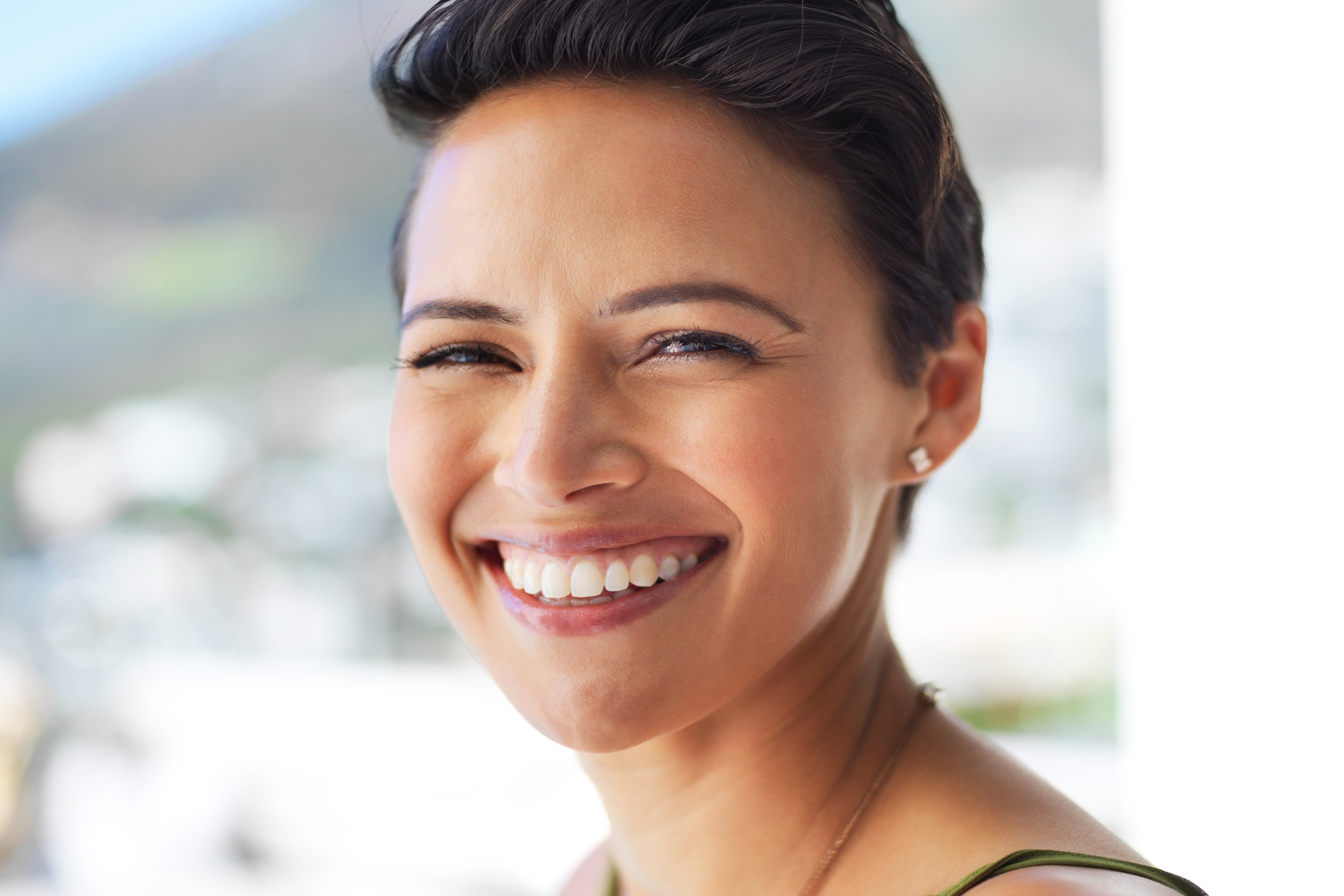 patient satisfied with her dental implant restorations from Chesterfield Dental Studio in Chesterfield MO